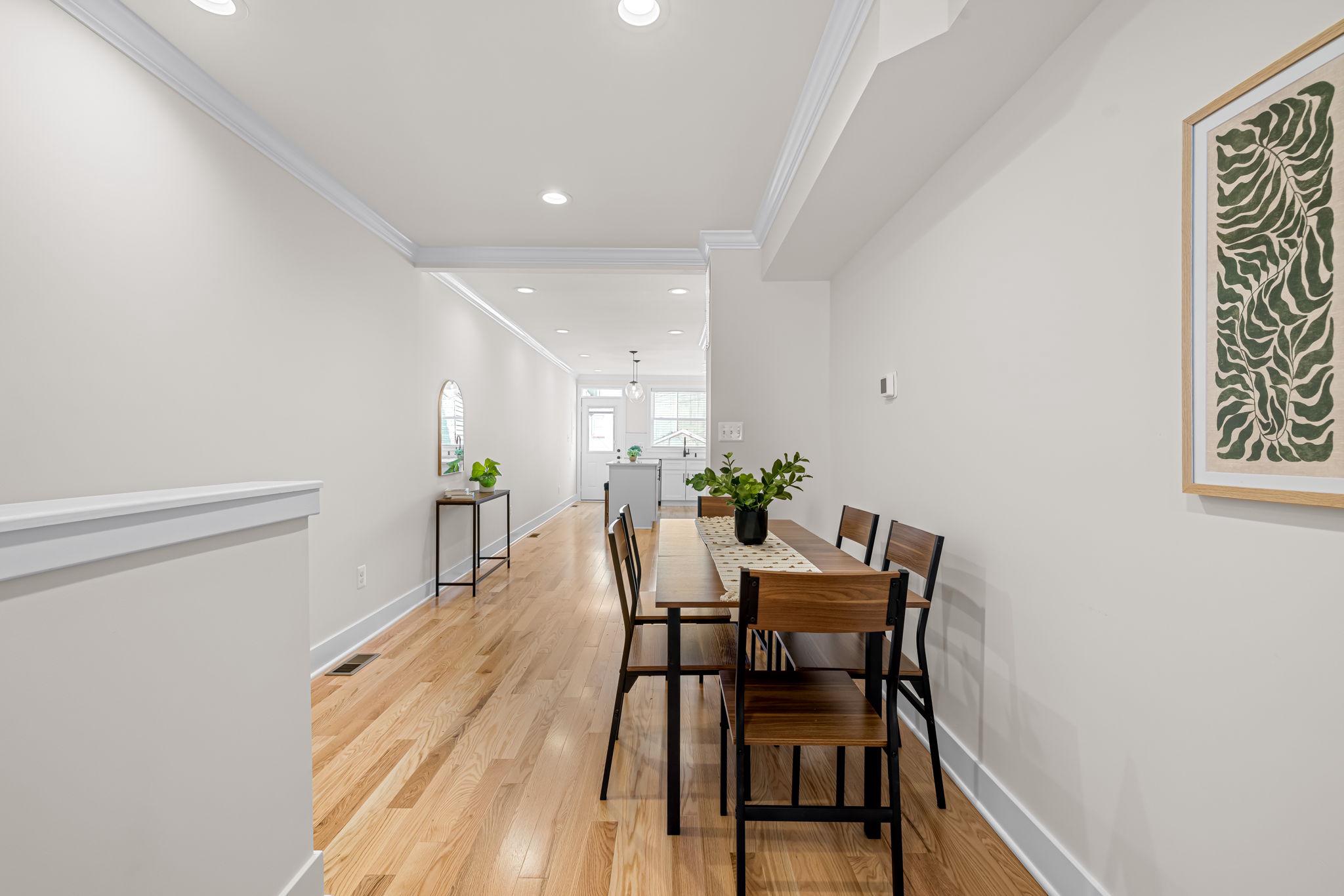 22 South Castle Street Baltimore, MD 21231 - Photo 7 of 32 a view of a dining room with furniture and wooden floor