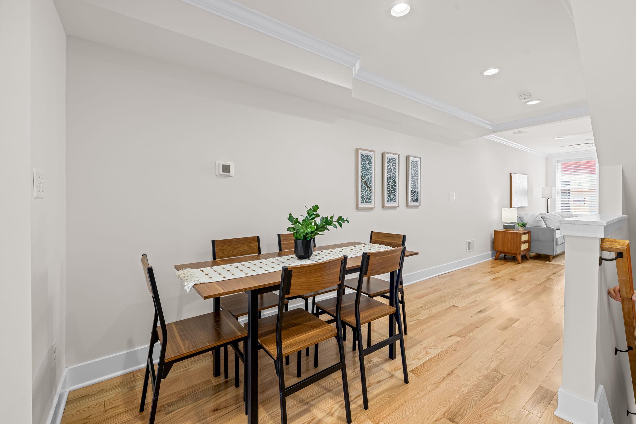 22 South Castle Street Baltimore, MD 21231 - Photo 8 of 32 a view of a dining room with furniture and wooden floor