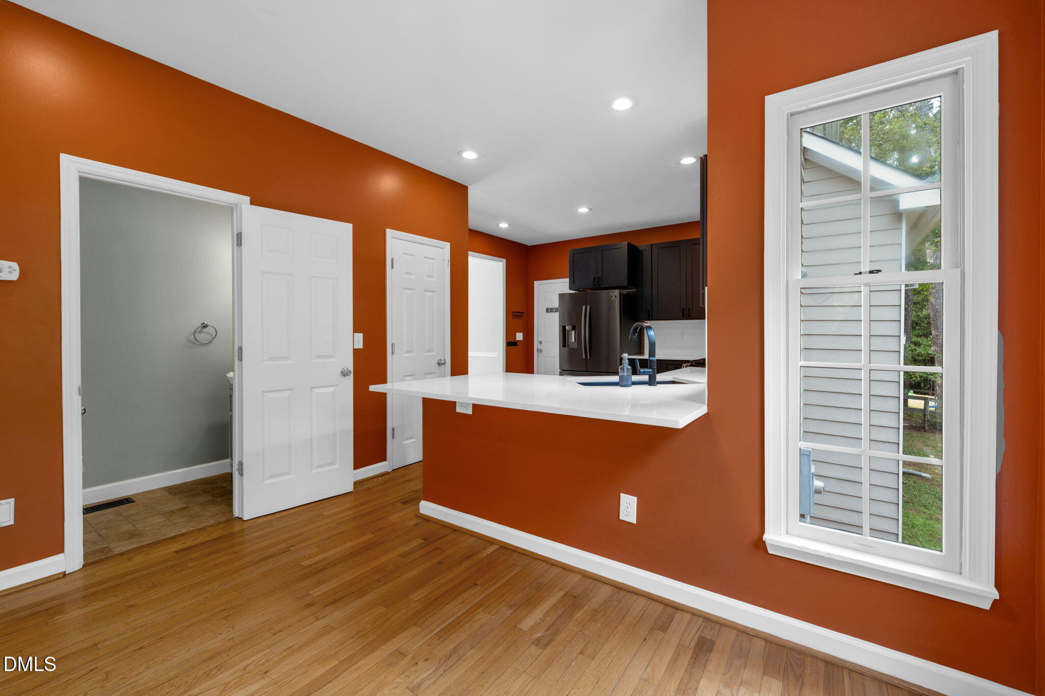 16 Quail Hunt Circle Durham, NC 27712 - Photo 18 of 61 a view of kitchen with cabinets and wooden floor
