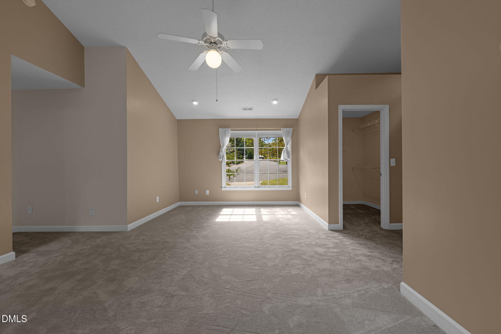16 Quail Hunt Circle Durham, NC 27712 - Photo 24 of 61 an empty room with windows and fan