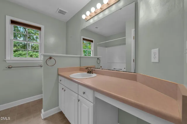 a view of a house with a swimming pool