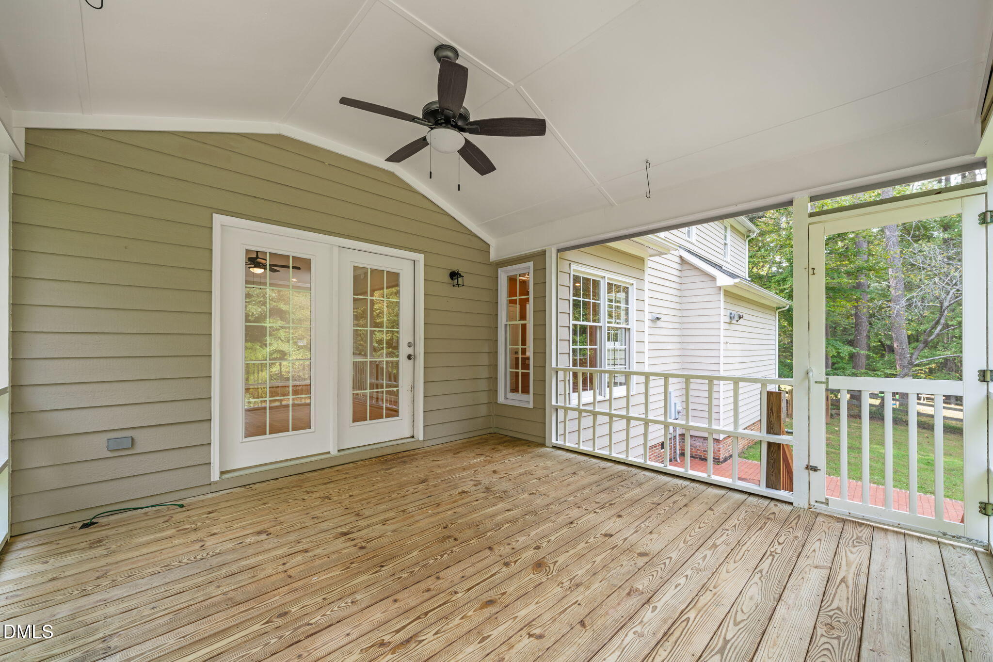 16 Quail Hunt Circle Durham, NC 27712 - Photo 40 of 61 a view of an empty room with wooden floor and a window