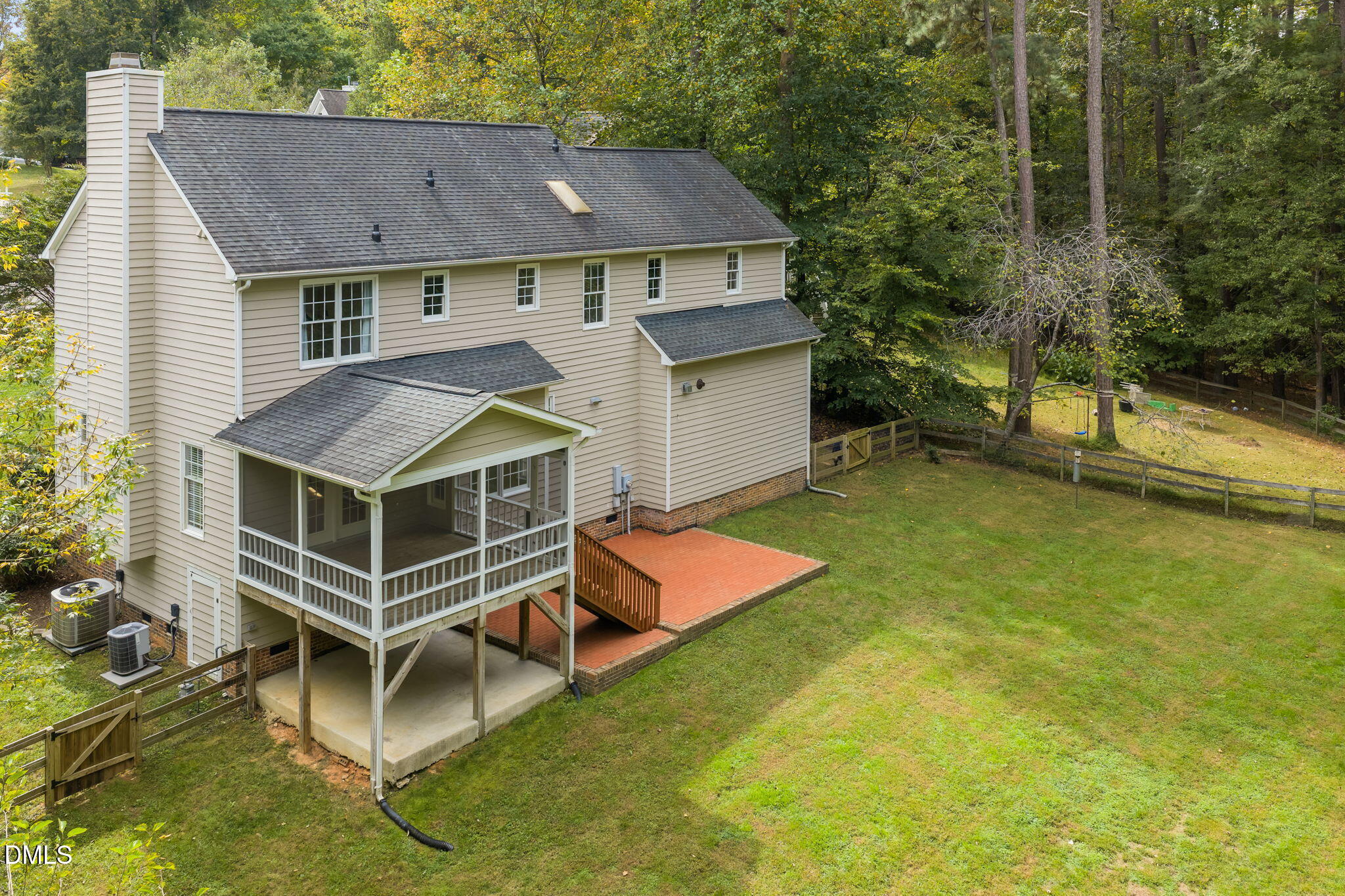 16 Quail Hunt Circle Durham, NC 27712 - Photo 46 of 61 an aerial view of a house with a yard table and chairs