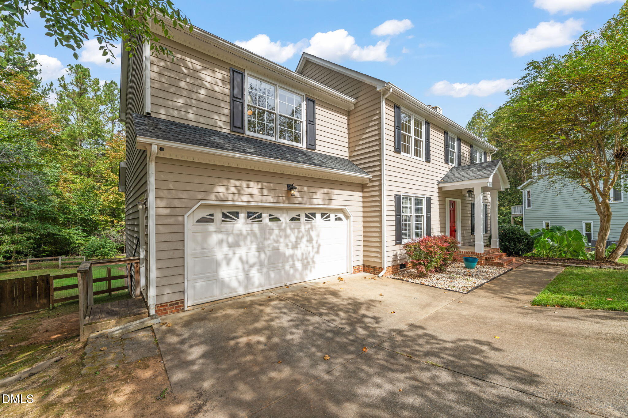16 Quail Hunt Circle Durham, NC 27712 - Photo 54 of 61 a front view of a house with parking area