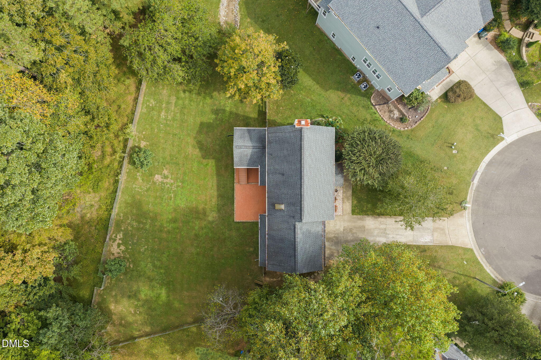 16 Quail Hunt Circle Durham, NC 27712 - Photo 59 of 61 an aerial view of a house with a yard and large tree