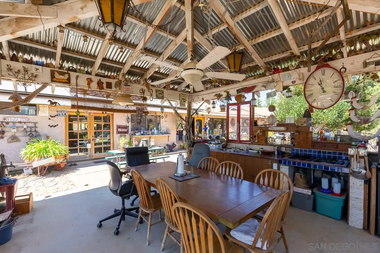 2029 Willow Glen Road Fallbrook, CA 92028 - Photo 18 of 46 a view of a dining room with furniture window and outside view