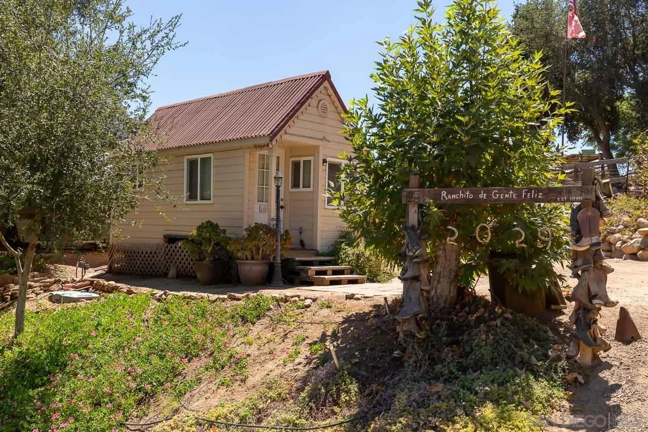 2029 Willow Glen Road Fallbrook, CA 92028 - Photo 23 of 46 a view of a house with backyard and sitting area
