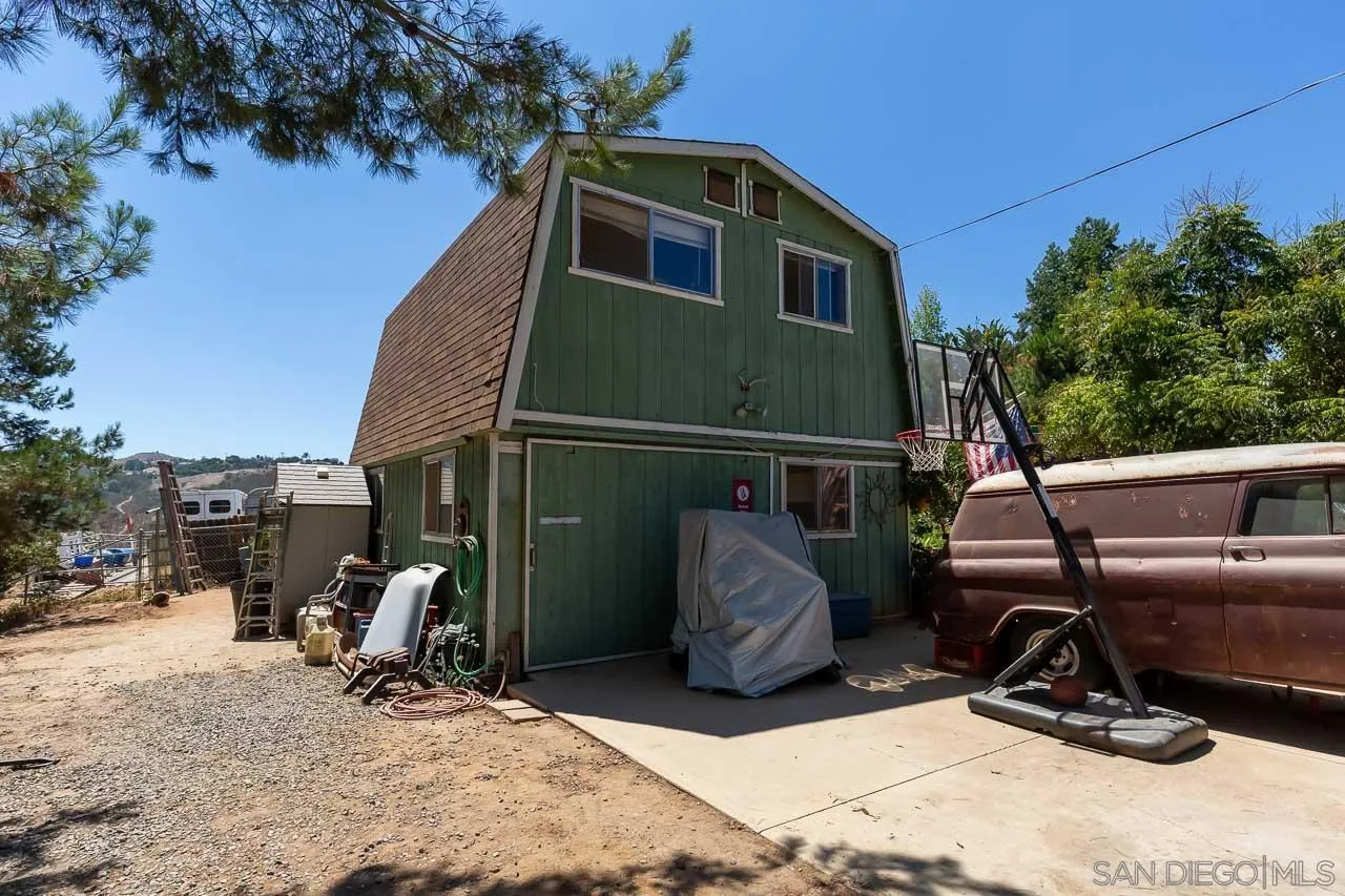 2029 Willow Glen Road Fallbrook, CA 92028 - Photo 30 of 46 a backyard of a house with barbeque oven and plants