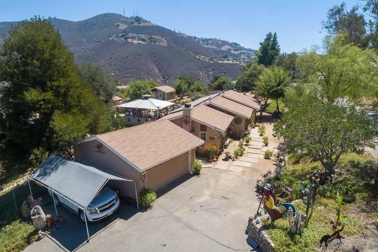 2029 Willow Glen Road Fallbrook, CA 92028 - Photo 38 of 46 an aerial view of a house with a yard and a large tree