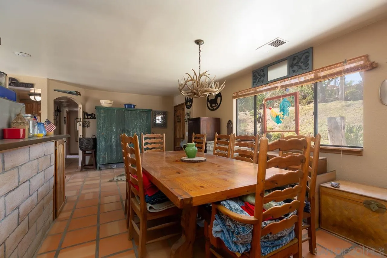 2029 Willow Glen Road Fallbrook, CA 92028 - Photo 7 of 46 a dining room with furniture and window