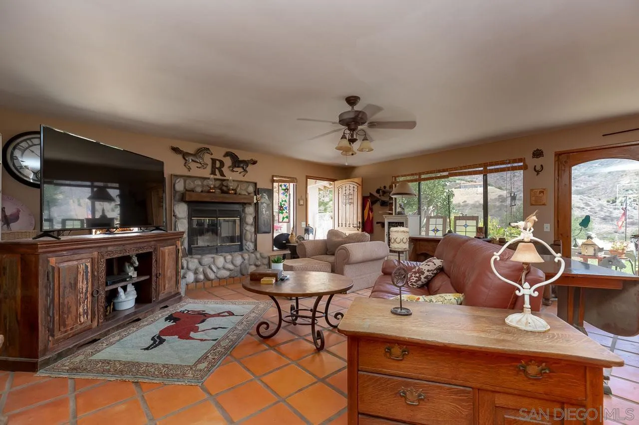 2029 Willow Glen Road Fallbrook, CA 92028 - Photo 8 of 46 a view of a dining room with furniture window and outside view