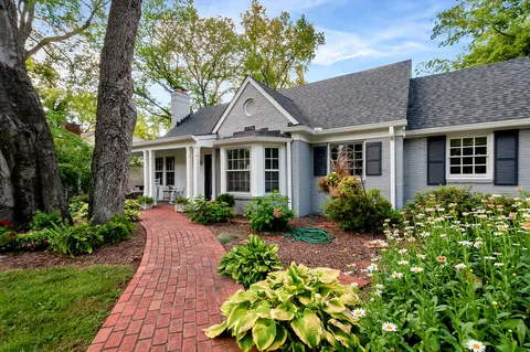 front view of a house with a yard