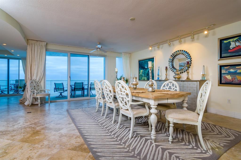 1350 Gulf Boulevard, Unit 901 Clearwater Beach, FL 33767 - Photo 26 of 63 a view of a dining room with furniture window and outside view