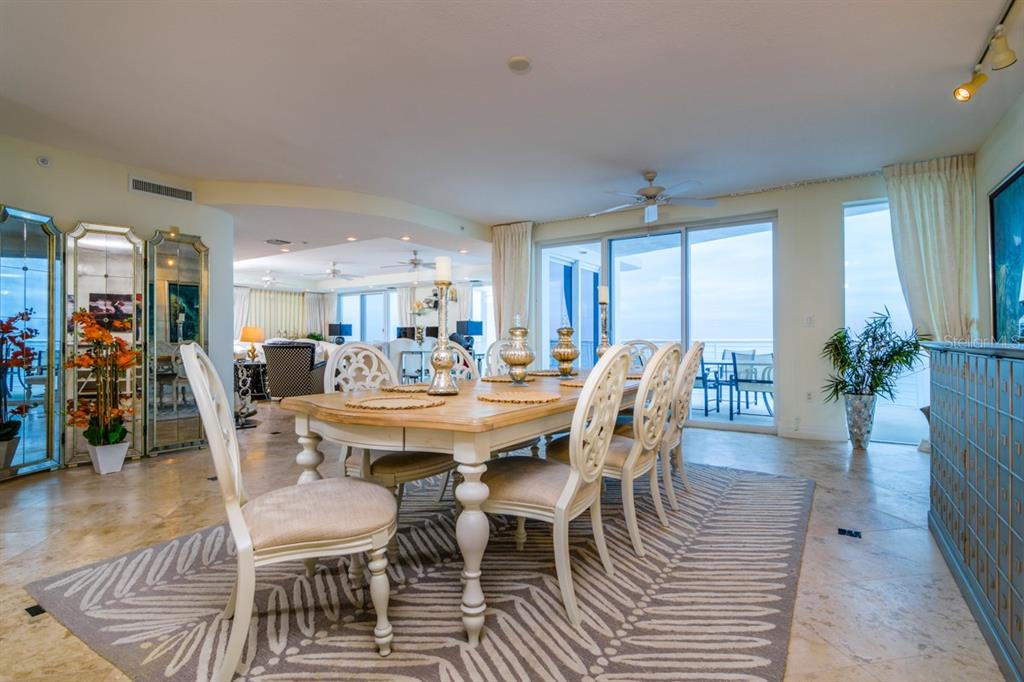 1350 Gulf Boulevard, Unit 901 Clearwater Beach, FL 33767 - Photo 27 of 63 a view of a dining room with furniture
