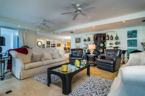 a living room with a bed and furniture