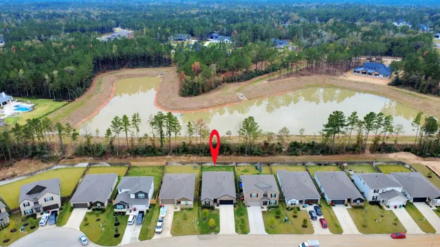 an aerial view of an swimming pool and outdoor space