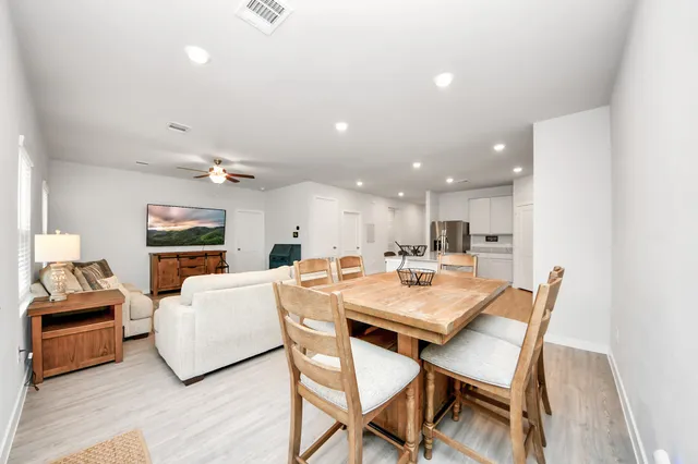 a view of a dining room with furniture