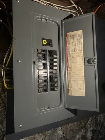 a bathroom with a toilet a sink and a window