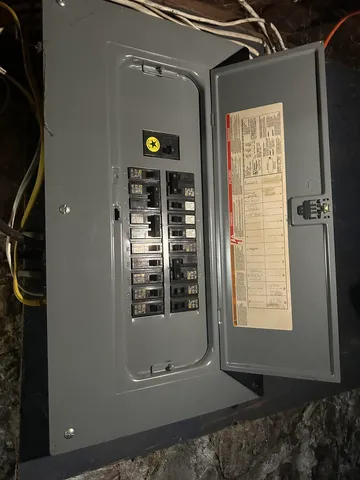 a bathroom with a toilet a sink and a window