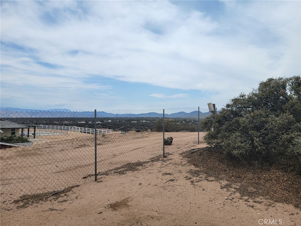 0 Daisy Road Oak Hills, CA 92344 - Photo 15 of 15 a view of a beach with a yard