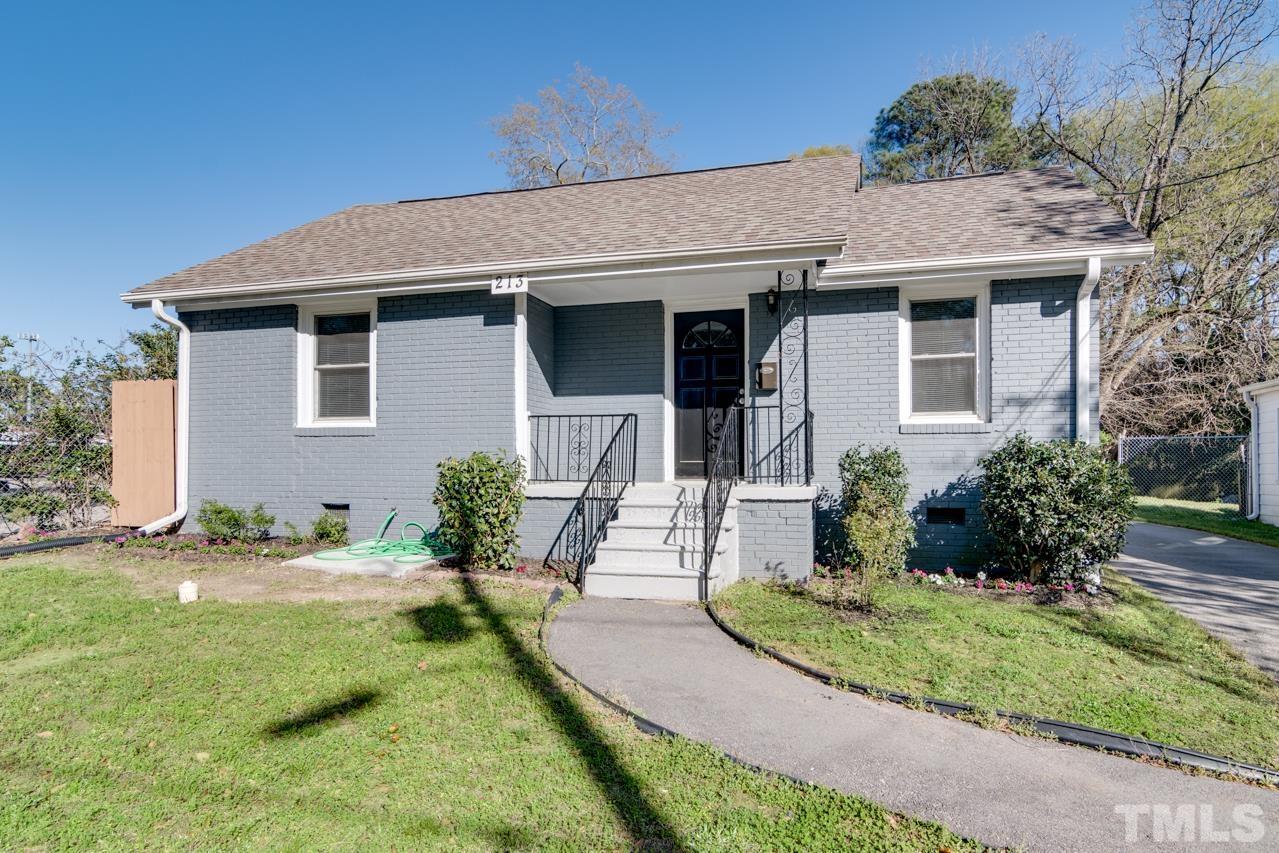 213 Angier Avenue Raleigh, NC 27610 - Photo 1 of 38 a front view of a house with garden