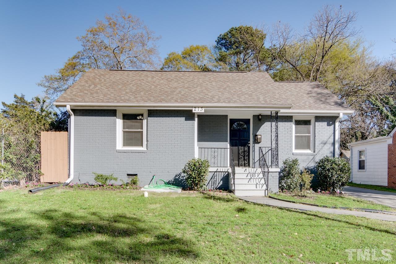 213 Angier Avenue Raleigh, NC 27610 - Photo 3 of 38 a house view with a garden space