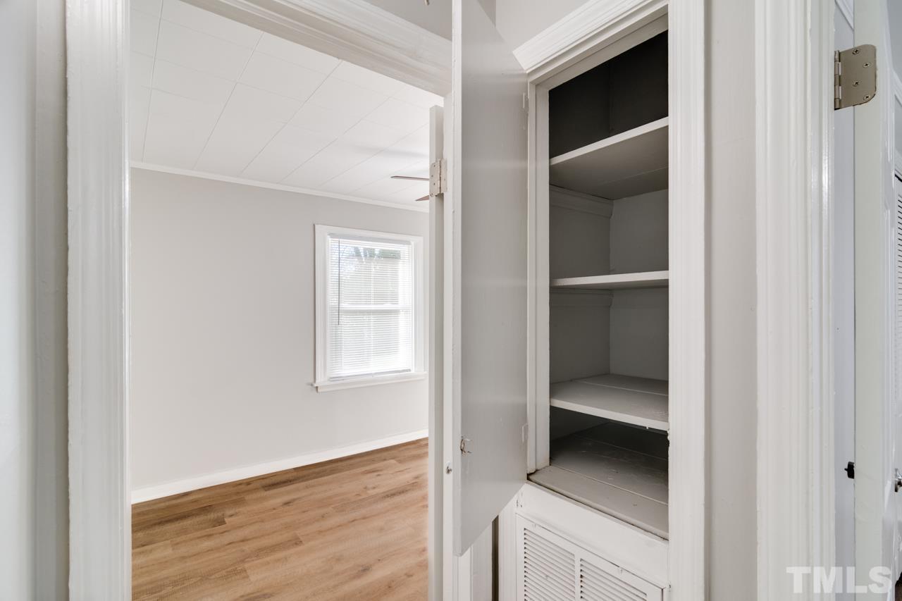 213 Angier Avenue Raleigh, NC 27610 - Photo 31 of 38 a view of an entryway and wooden floor