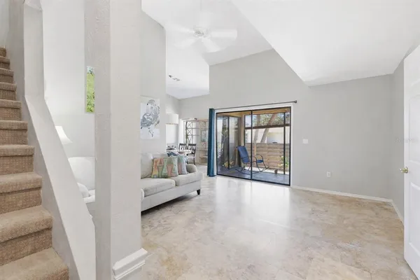 a view of an empty room with a fireplace