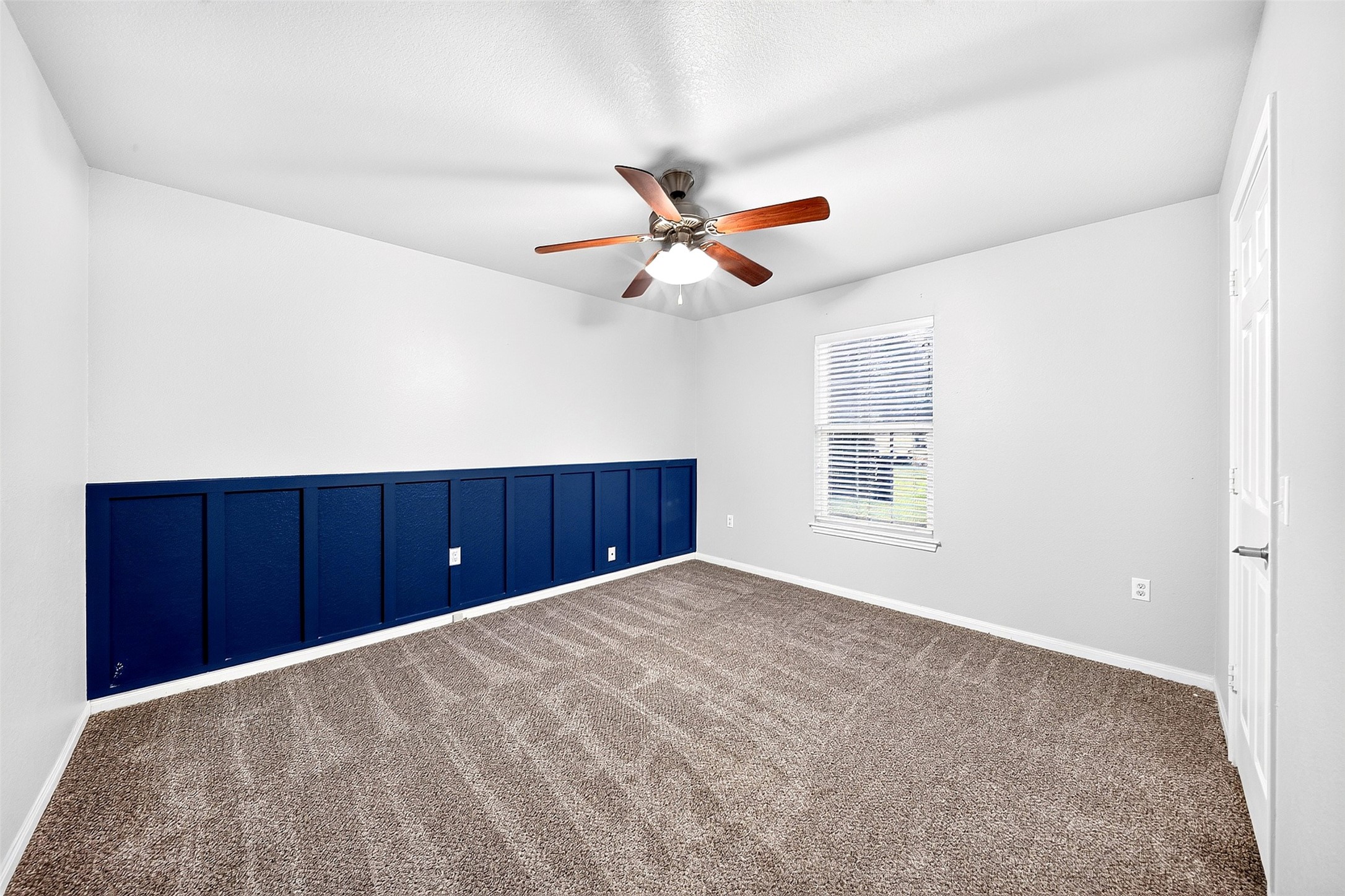 148 Fear Road Winnie, TX 77665 - Photo 20 of 34 You will love the accent wall in the secondary bedroom. Spacious interior design highlights extra-wide doors for all bedrooms and bathrooms.