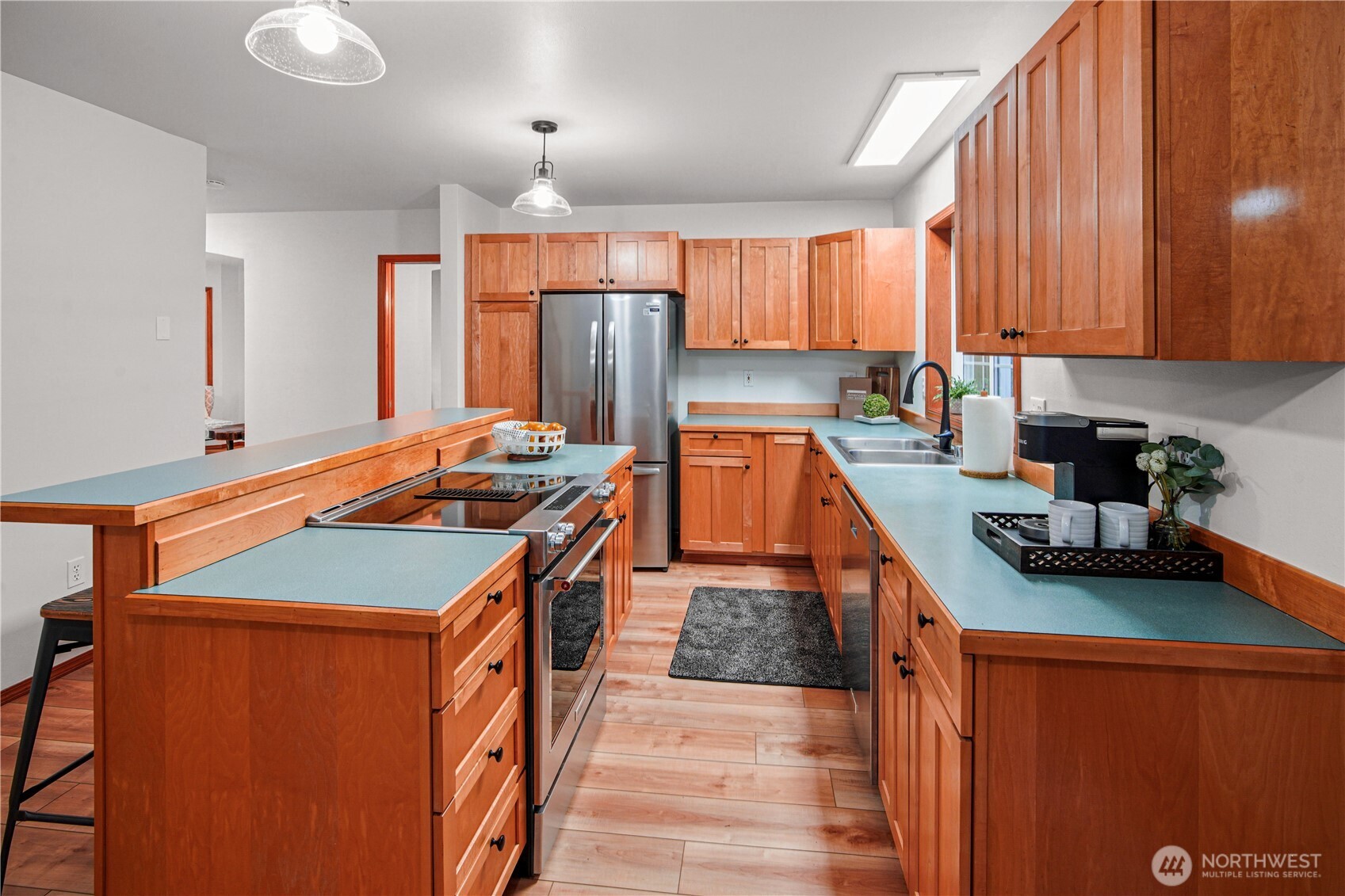 8045 Prather Road Southwest Centralia, WA 98531 - Photo 12 of 33 a kitchen with stainless steel appliances granite countertop a sink a stove and a refrigerator