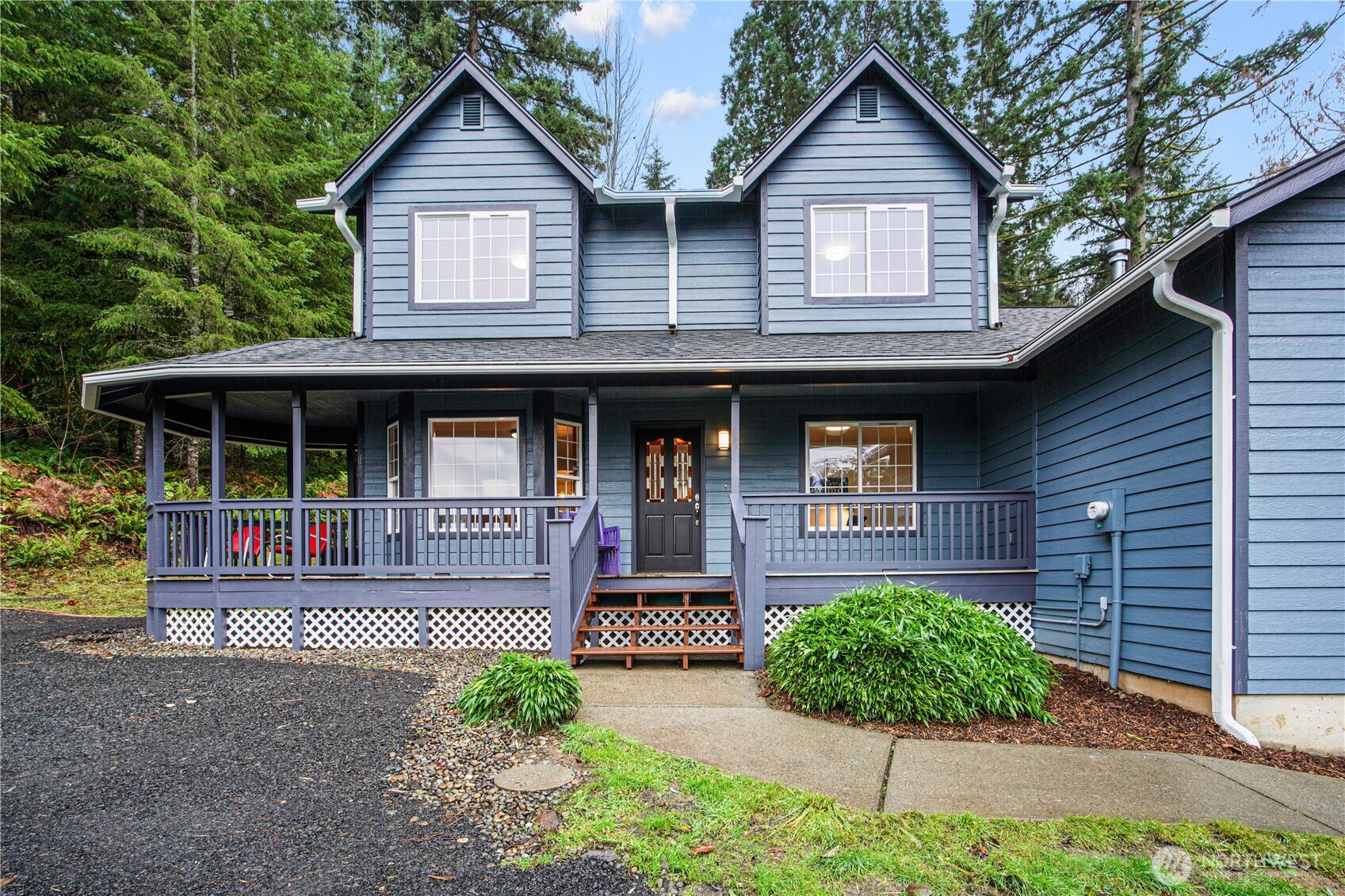 8045 Prather Road Southwest Centralia, WA 98531 - Photo 2 of 33 a front view of a house with garden