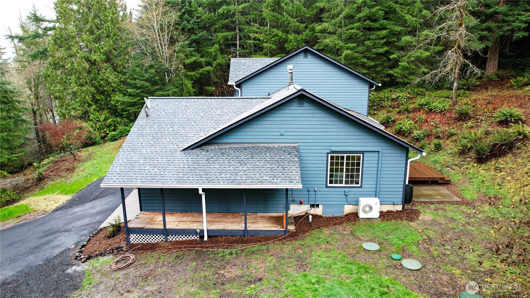 8045 Prather Road Southwest Centralia, WA 98531 - Photo 6 of 33 a backyard of a house with table and chairs