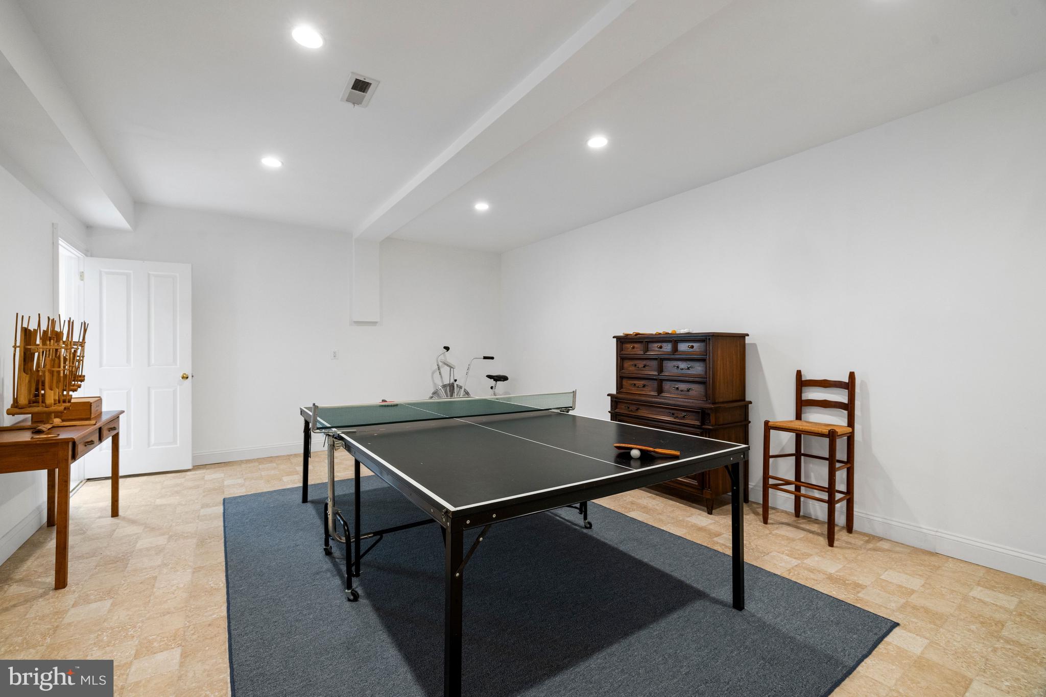 20147 Woodtrail Road Round Hill, VA 20141 - Photo 37 of 41 a room with furniture and wooden floor