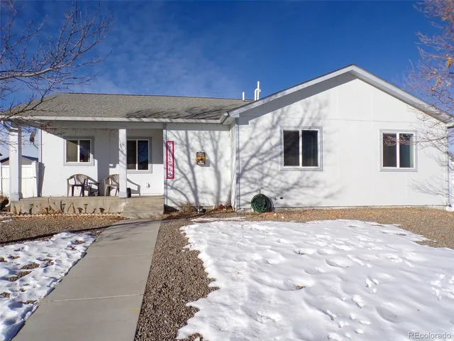 a view of a house with a patio