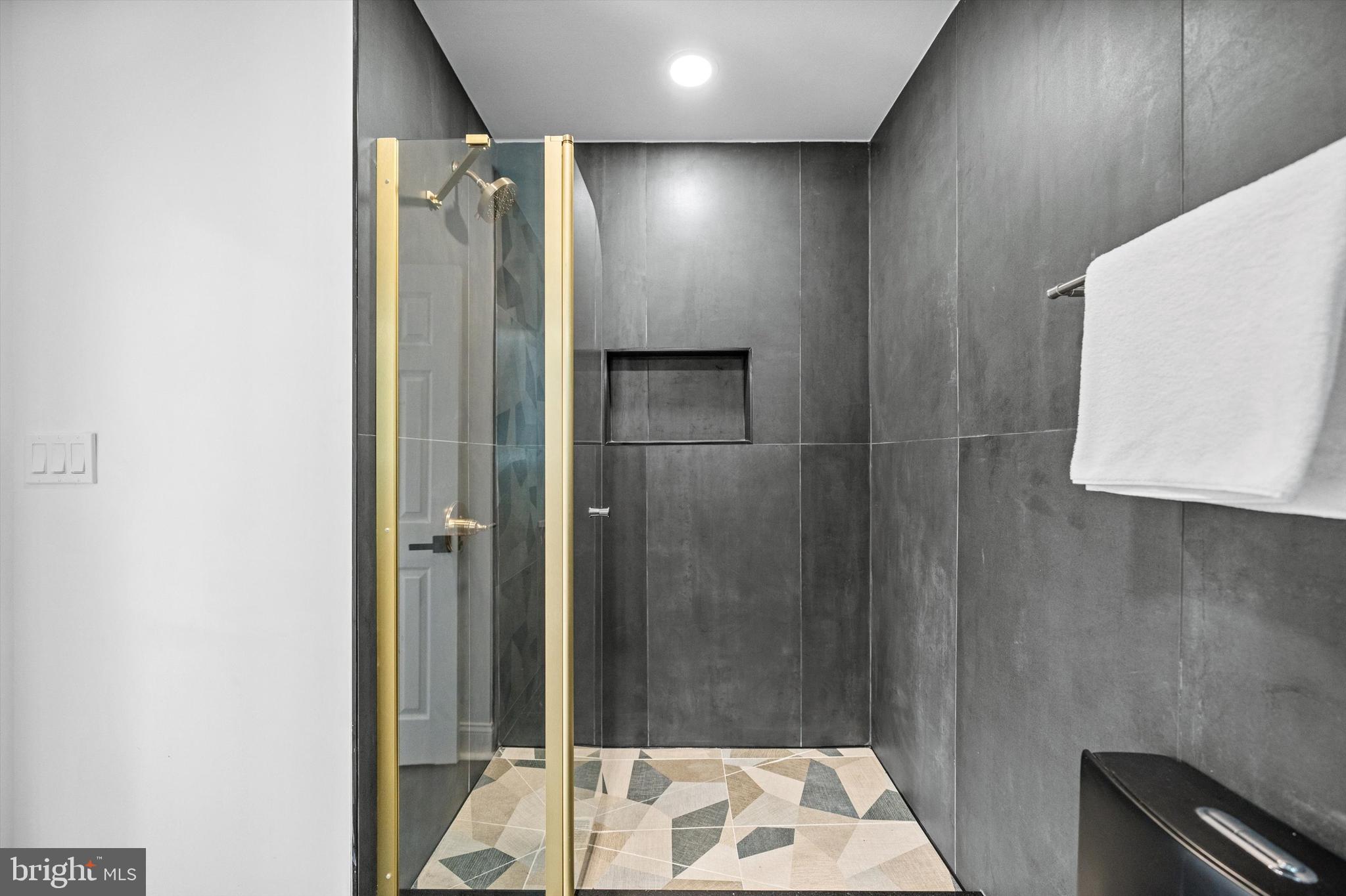 65 Bates Street Northwest Washington, DC 20001 - Photo 13 of 23 a bathroom with a shower and a sink