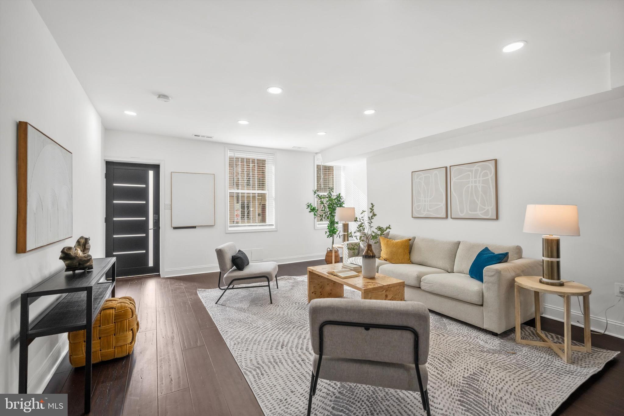 65 Bates Street Northwest Washington, DC 20001 - Photo 5 of 23 a living room with furniture