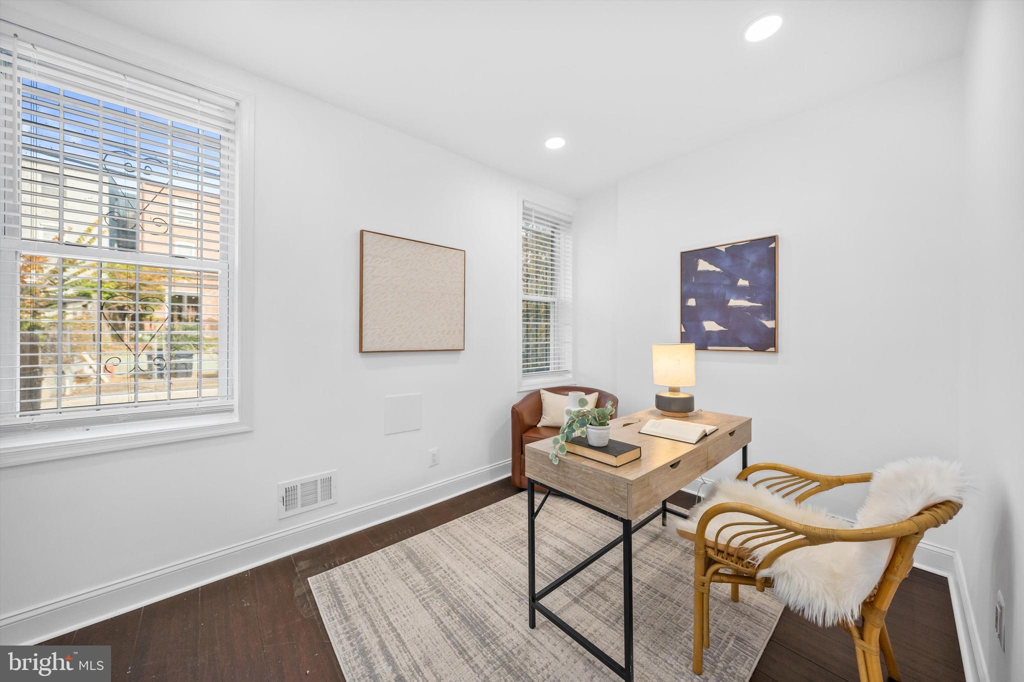65 Bates Street Northwest Washington, DC 20001 - Photo 9 of 23 a view of a workspace with furniture and a window