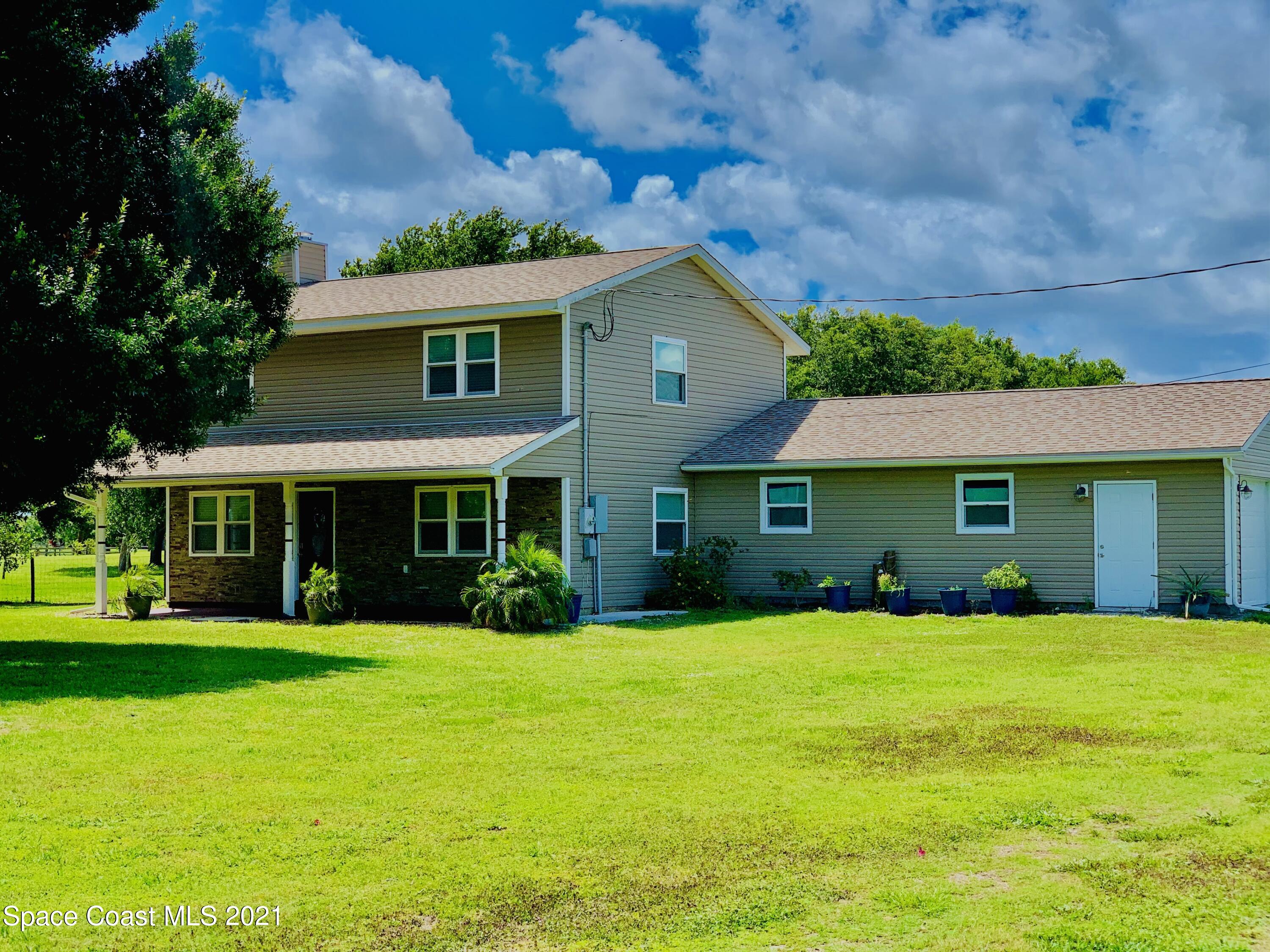 3155 Lionel Road Mims, FL 32754 - Photo 1 of 61 primary view