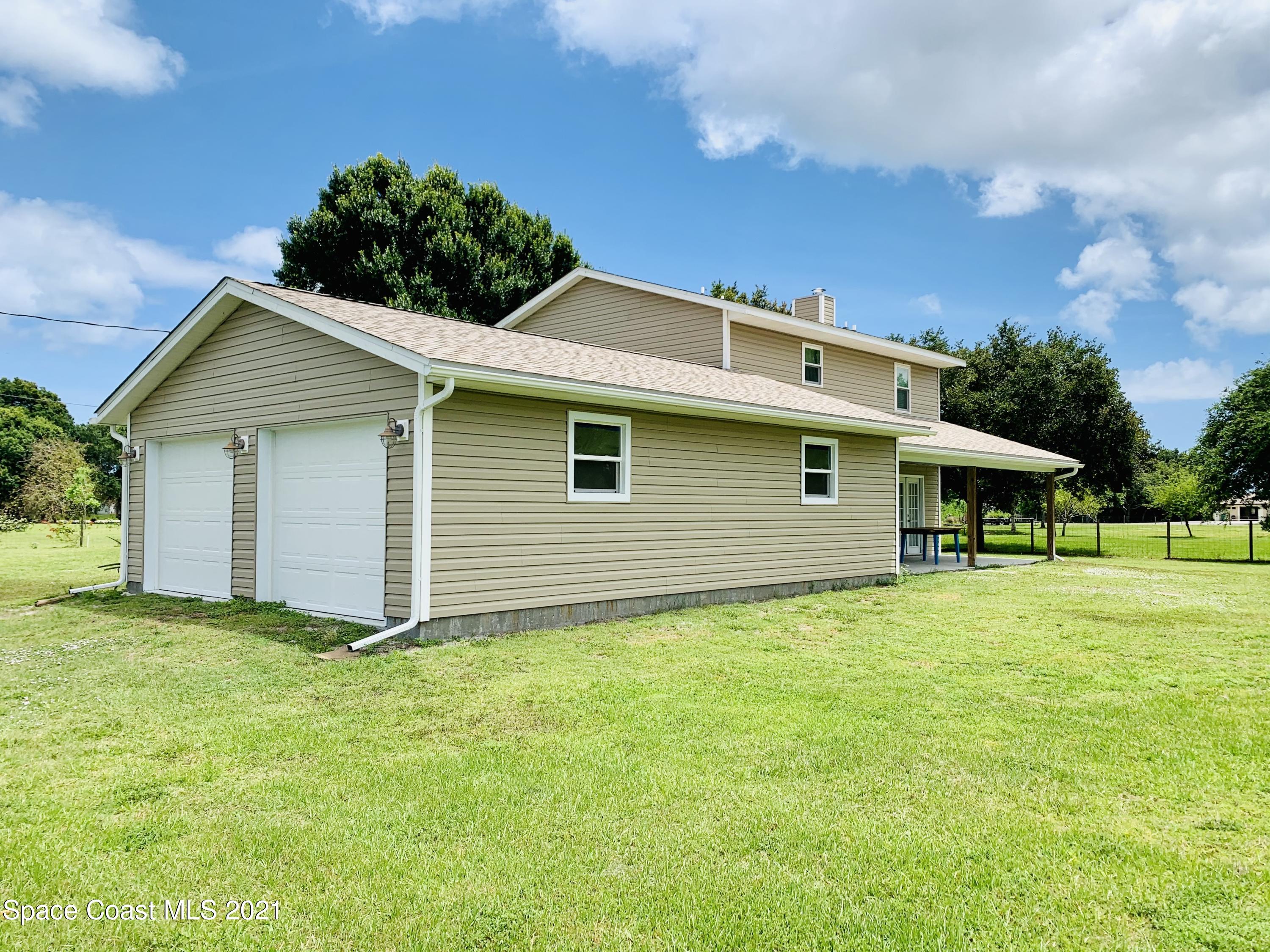 3155 Lionel Road Mims, FL 32754 - Photo 18 of 61 view from back