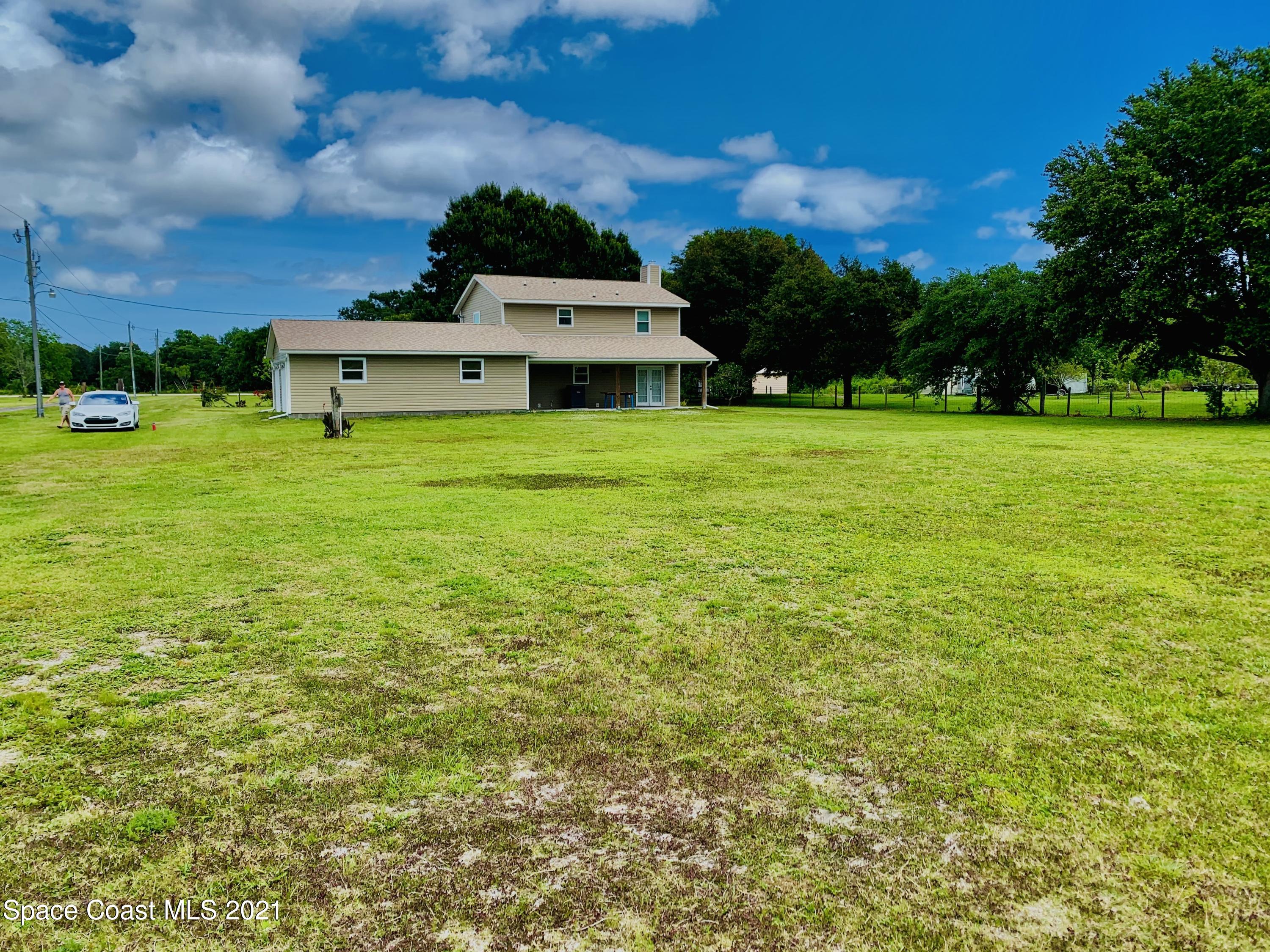 3155 Lionel Road Mims, FL 32754 - Photo 22 of 61 backyard acreage