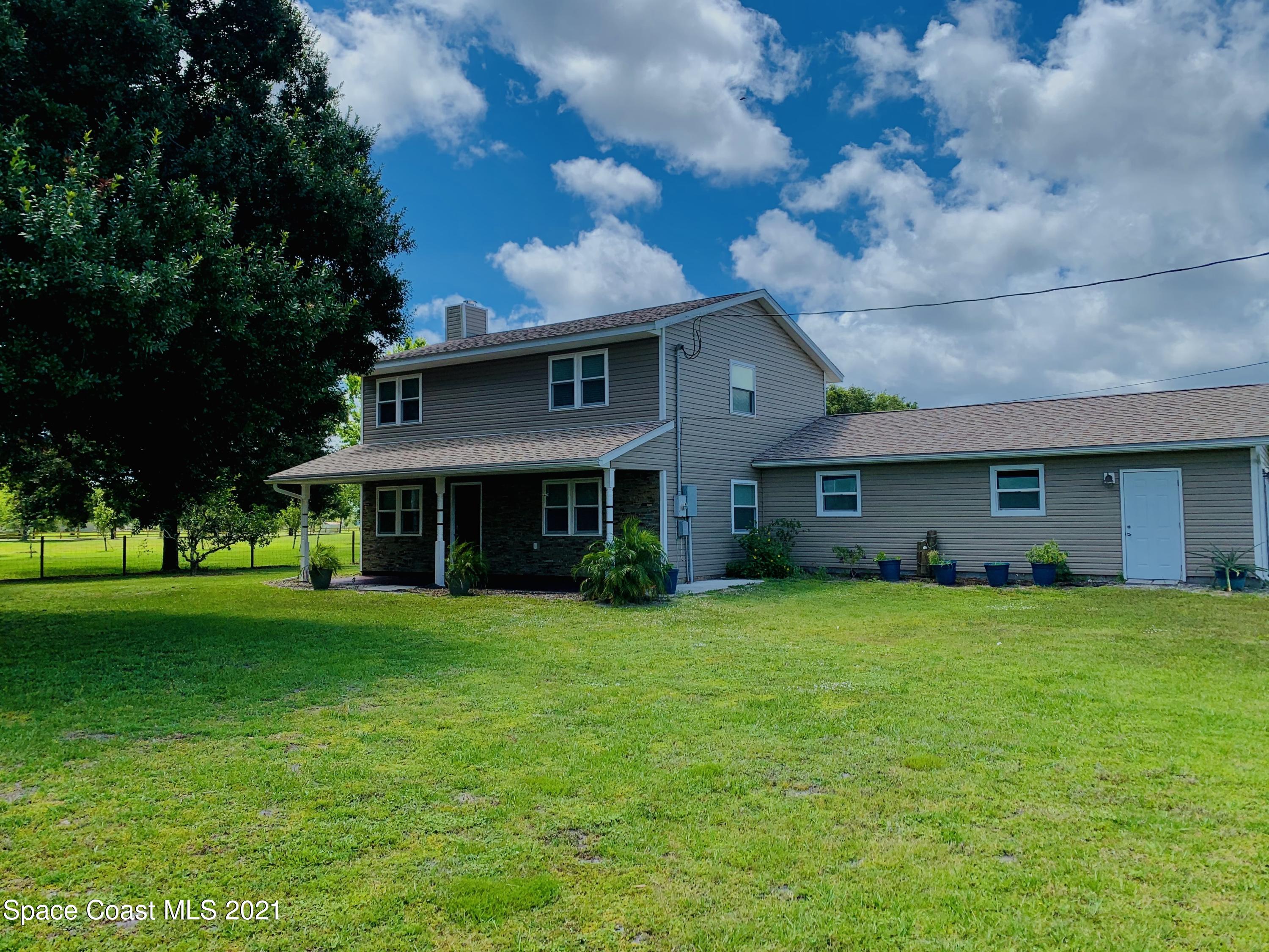 3155 Lionel Road Mims, FL 32754 - Photo 25 of 61 front view