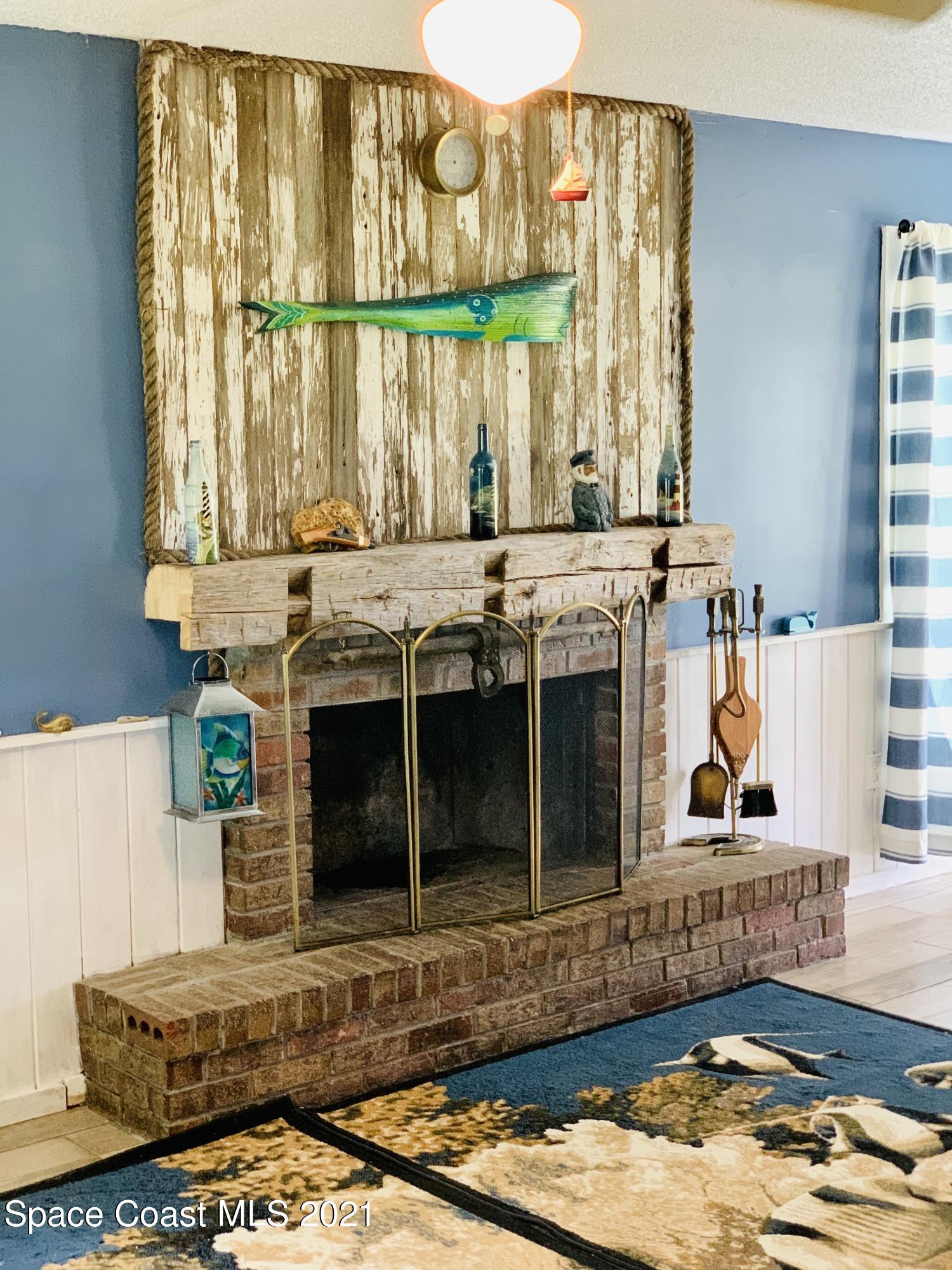 3155 Lionel Road Mims, FL 32754 - Photo 6 of 61 wood burning fireplace