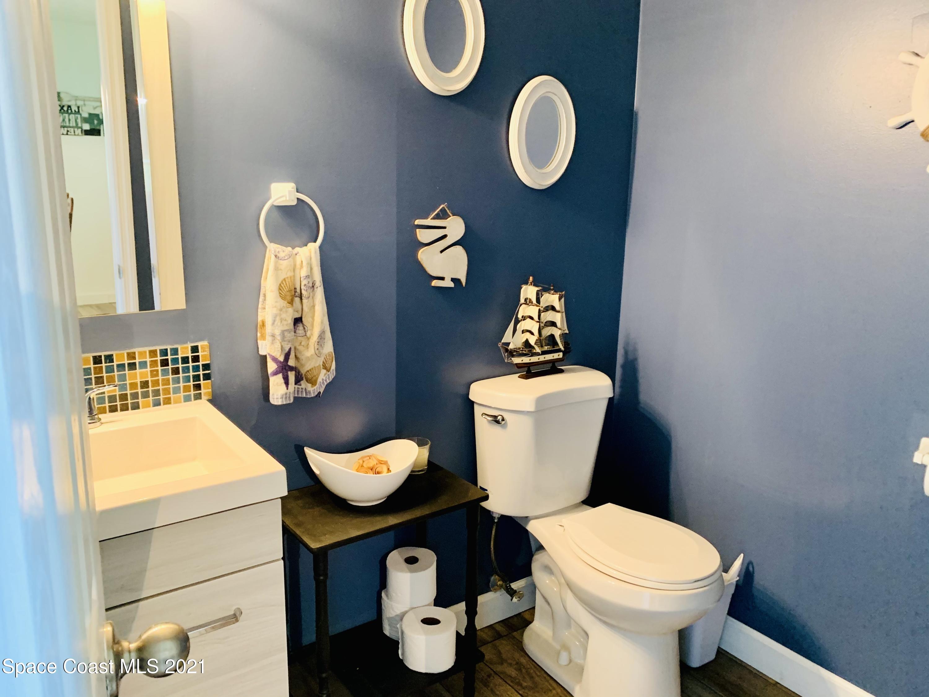 3155 Lionel Road Mims, FL 32754 - Photo 54 of 61 downstairs half bath