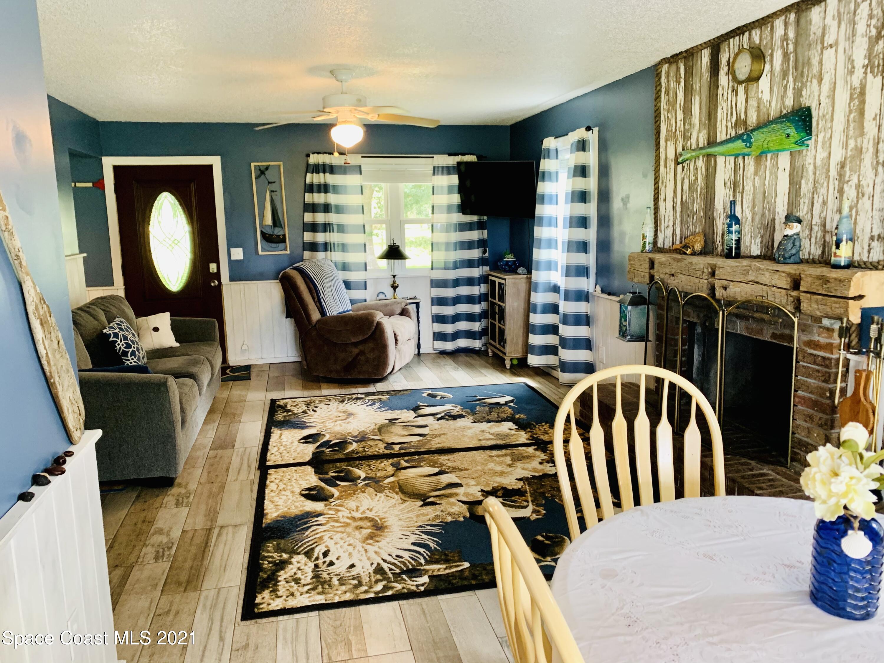 3155 Lionel Road Mims, FL 32754 - Photo 7 of 61 living/dining
