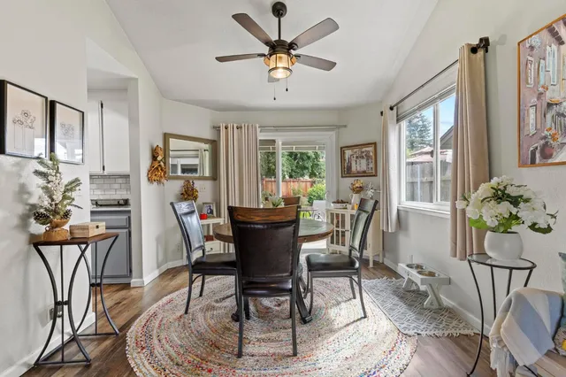 a view of a dining room with furniture window and outside view