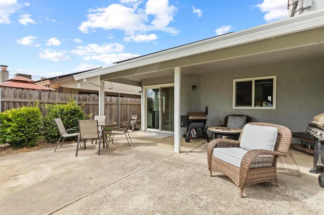 a outdoor living space with furniture and a couch