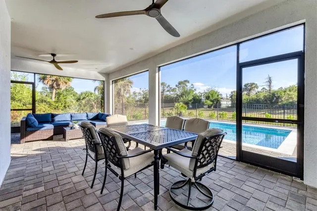 a view of a chairs and table on the terrace