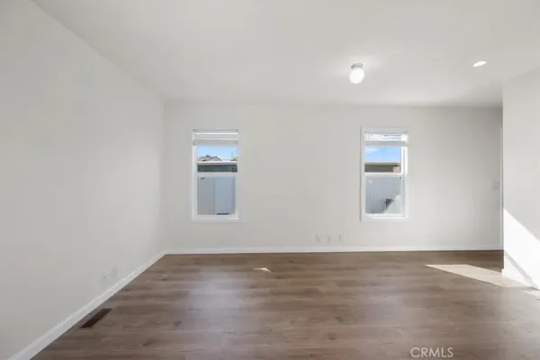 a view of kitchen view wooden floor and window