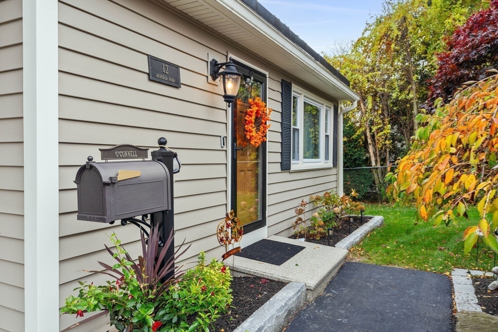 12 Dixfield Road Worcester, MA 01606 - Photo 2 of 42 a front view of a house with garden