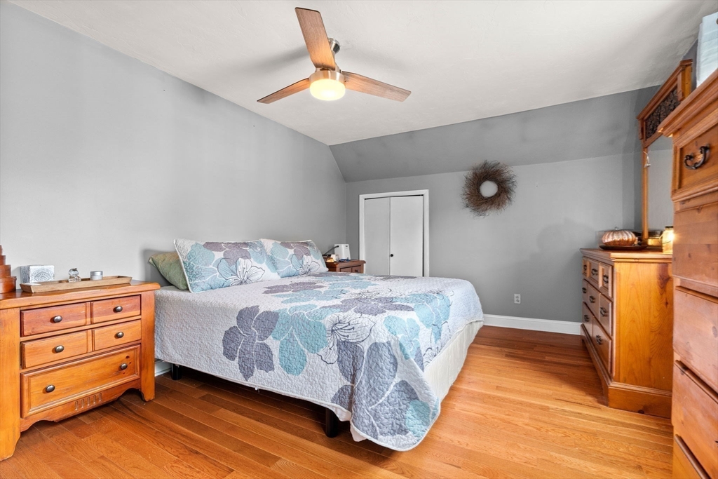 12 Dixfield Road Worcester, MA 01606 - Photo 21 of 42 a bedroom with a bed and a dresser